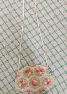 A Sling Bag With Pearls