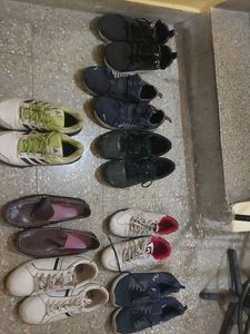Am Selling My 8 Pairs Of Used Branded Shoes Size 9