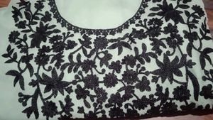Elegant Embroidered unstitch material.