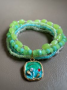 Green Beaded Bracelet with Floral Charm