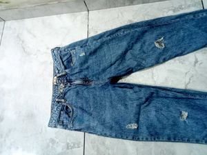 Ripped Blue Denim Jeans