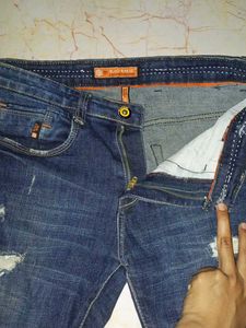 Distressed Blue Jeans
