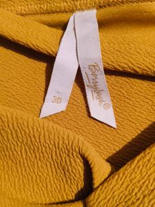 Mustard Knot Mini Skirt