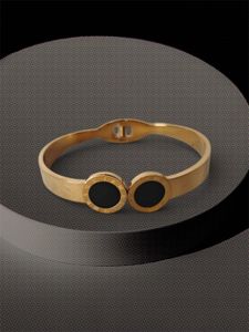 Elegant Gold Tone Bangle