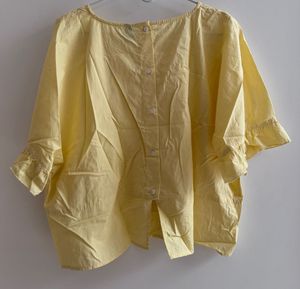 UCB Yellow Solid Styled Back Pure Top