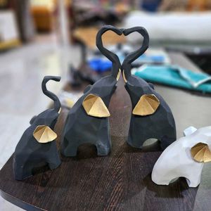 Elephant Charm Statues in Varying Sizes