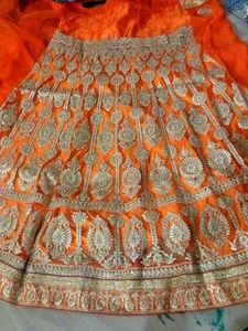Orange Embroidered Lehenga style saree