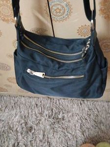 8 Zip Hand Sling Bag