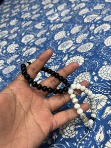 pair of two batcelets black and white