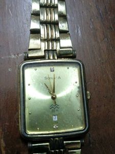Sonata Gold Watch