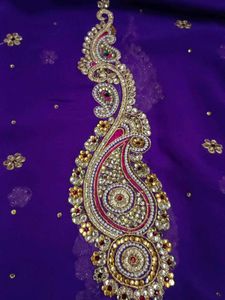 A Purple Blue Saree With Heavy Work
