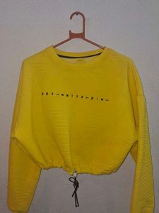 yellow cropped sweatshirt