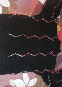 Cozy Black Knit Sweater with Wavy Trim
