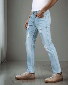 Ripped Light Wash Denim Jeans