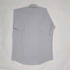 BALENCIAGA  Light Blue Half Shirt
