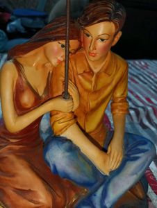 Vintage Couple Under Umbrella Figurine