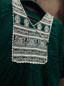 Discover this elegant emerald green kurta featurin