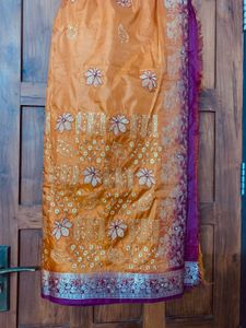Silk saree in orange colour and wine mundani