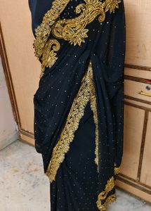 expansive 🔥 daimond work Black & Gold Saree