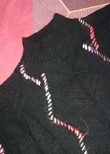Cozy Black Knit Sweater with Wavy Trim