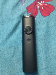 MI TRIMMER NEW CONDITION