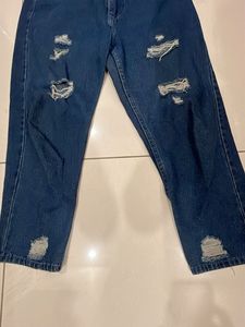 Ripped Blue Jeans