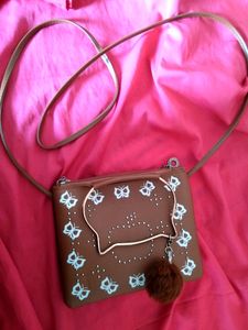 Kitty Sling bag