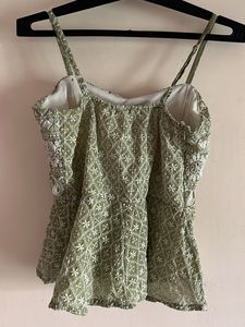 Embroidered Peplum Top