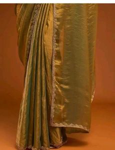 Elegant Gold Saree with Embellished Border
