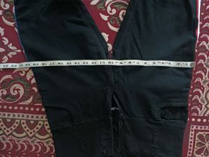 Black One Leg Knee Cut Jeans