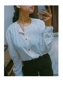 A Perfect Women's White Shirt For This Summer