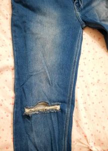 Ripped Knee Jeans