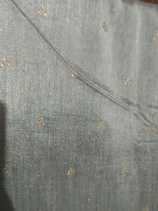 Grey Colour Saree With Golden Border