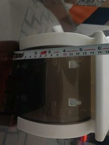 white tissue holder with flat storage on top