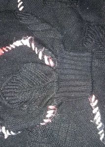 Cozy Black Knit Sweater with Wavy Trim