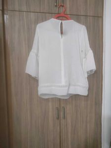 White Peplum Top