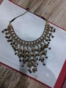 Golden And Black Necklace