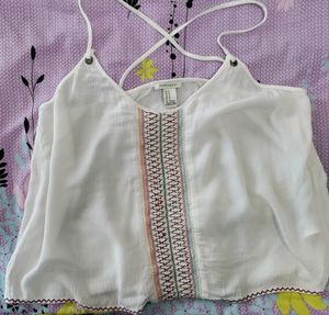 sleeveless top ,bust size-36,goes well on jeans and skirts