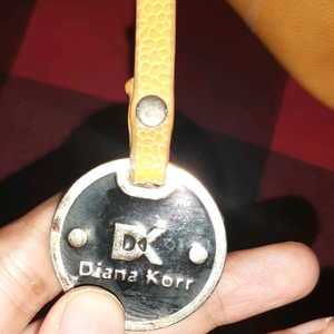 Diana Korr mustard coloured bag