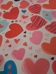 A HEART TRIANGLE SHAPED NAPKIN