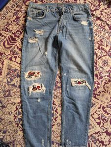 Distressed Wide-Leg Jeans