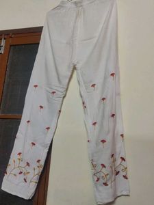 White Plazzo Having Floral Embroidery.