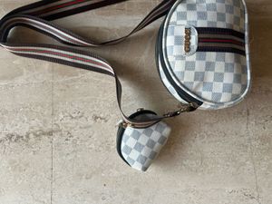 Gucci white sling bag