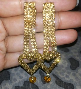 Golden and oxidized earrings