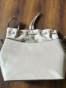 Beige colour big handbag bag