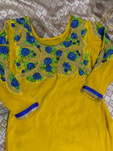 Yellow Kurta With Blue Patch Work