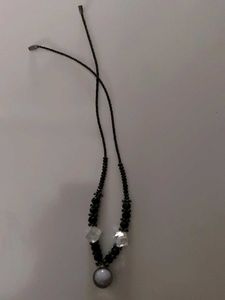 The necklace in th