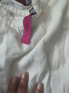 White Sleeveless Top