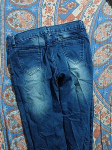 Ripped Blue Denim Jeans