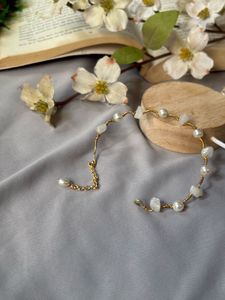 wire wrapped rose quartz and pearl bracelet